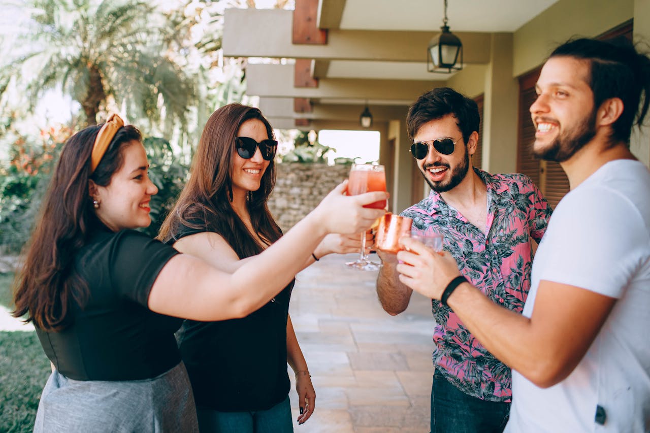 Crafting Captivating Headlines: Your awesome post title goes here A cheerful group of friends enjoying a summer party outdoors with drinks.